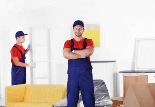 Packed boxes and furniture ready for transport in a Westkensington flat