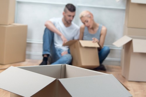 Person organizing items in a West Kensington self storage unit