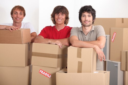 Small removals team preparing furniture in Westkensington